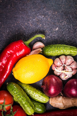 Assortment of fresh vegetables close up on black table