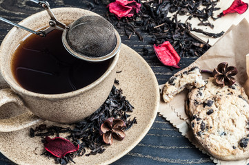 cup of tea and cookies with chocolate