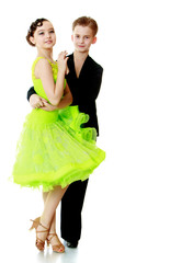 boy and adolescent girl in fancy dance costumes - Isolated on white background