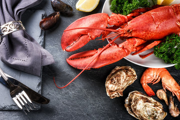 Fine selection of crustacean for dinner. Lobster, oysters and sh
