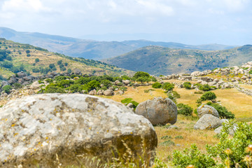 Fototapeta na wymiar Wild, rocky landscape on the island of Tinos, Greece.
