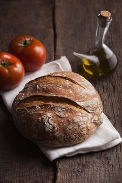 Big Bread with Tomatoes and Oil for preparing the typical spanish Pan Tumaca