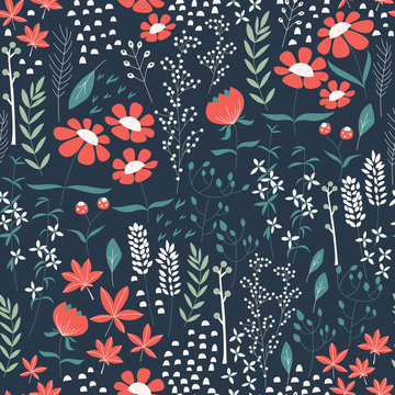 Seamless pattern design with hand drawn flowers and floral eleme