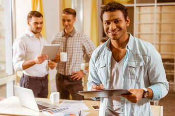 Young handsome businessmen coworking