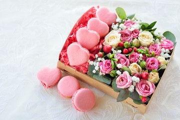 French macaroon heart-shaped Valentine's Day, the box with flowe
