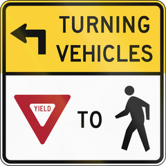 United States MUTCD road sign - Turning vehicles yield to pedestrians