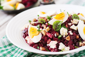 Salad baked beets, feta cheese, eggs, and walnuts