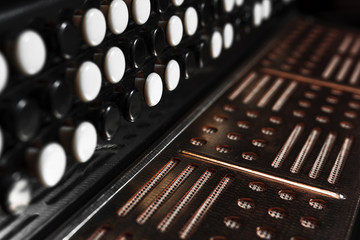Close-up accordion against a black background