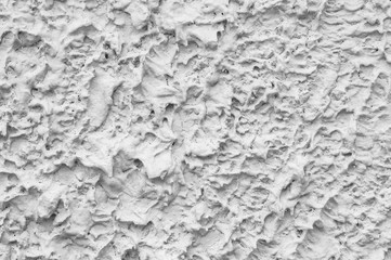 Closeup old and pale rough red cement wall background in black and white tone