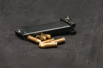 Magazine and bullets into the gun
