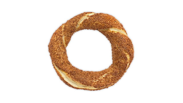 Seamless loop of traditional Turkish food called as Simit in Turkey. It is very popular local bagel made with sesame and can be tasted in Istanbul.