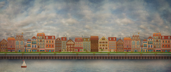 Group of houses along coast of river