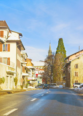 Fototapeta na wymiar View of road in a town in winter Switzerland