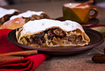 Apple strudel or apple pie  with dates and cinnamon