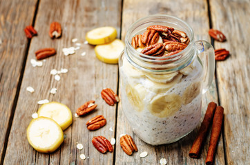 homemade healthy Chia seeds banana pecan overnight oatmeal in ja