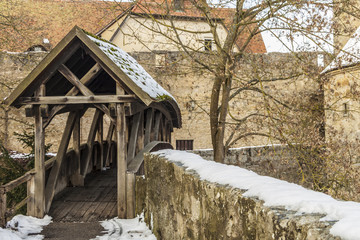 a old wooden bridge in winter