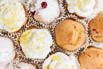 Muffins with cranberries and lemon zest, closeup