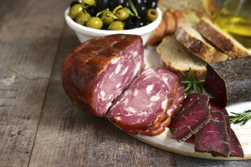 Assortment of italian antipasti .