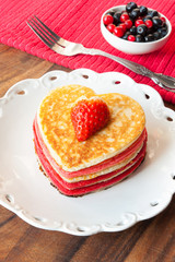 Festive dish-Valentines day homemade colored heart shaped pancakes