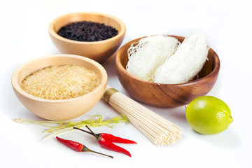 Rice in a wooden bowl isolated