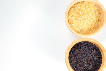 Rice in a wooden bowl isolated