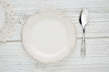 Empty plate dish with spoon food hungry concept