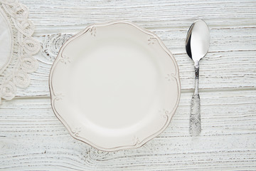 Empty plate dish with spoon food hungry concept