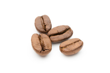 Coffee beans isolated on white background, closeup, macro