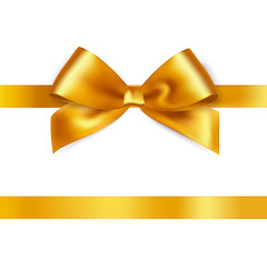 Shiny gold satin ribbon on white background