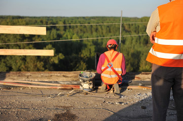 Repair work on the bridge over the river.