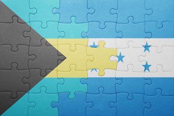 puzzle with the national flag of honduras and bahamas