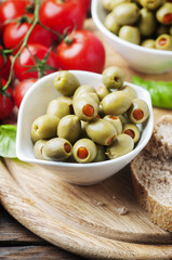 Spanish olives on the wooden table