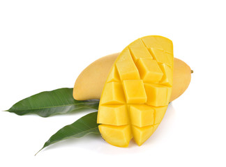 ripe mango with green leaf on white background.