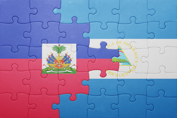 puzzle with the national flag of nicaragua and haiti