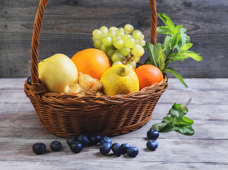 Wicker straw basket with an assortment of fruits