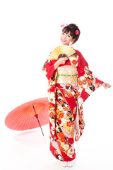 attractive asian woman wearing kimono isolated on white background