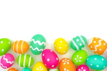 Fototapeta na wymiar Colorful Easter egg bottom border against a white background