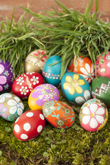 Colourful easter eggs on grass