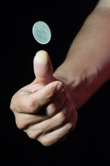 Flipping a coin with the right hand