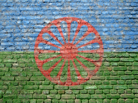 Romani flag on old wall