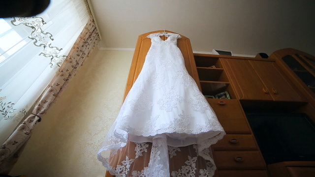 Wedding dress in motion. Festive beautiful clothes for girl, female, miss, lady