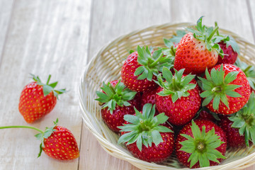 Strawberry in wood basket