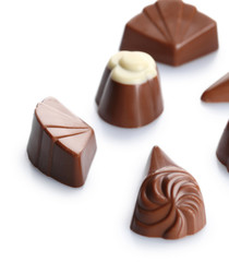 Assorted chocolate candies, isolated on white