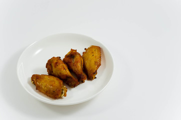 Barbecue chicken wing on white plate