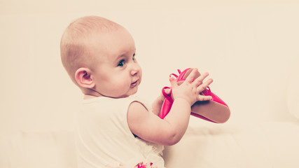 Little girl with red shoes