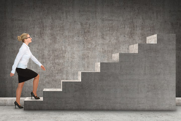Business person stepping up a staircase. business concept

