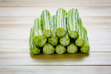 Moringa Oleifera on wood background