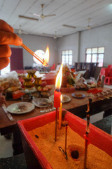 Buring incenses to worship the ancestors