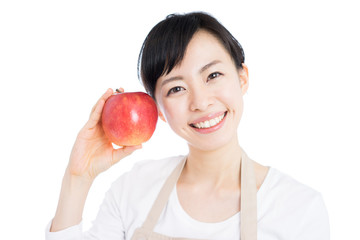 りんごを持った女性