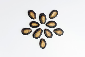 Watermelon seeds on white background